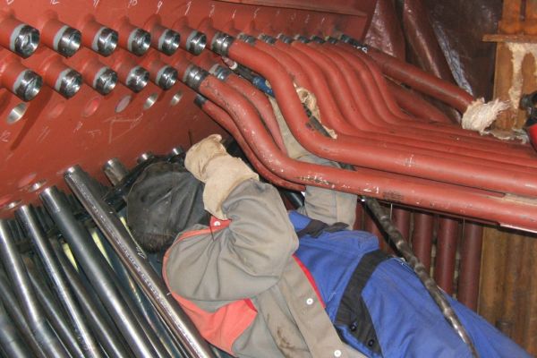 Welding of pipes to the boiler body